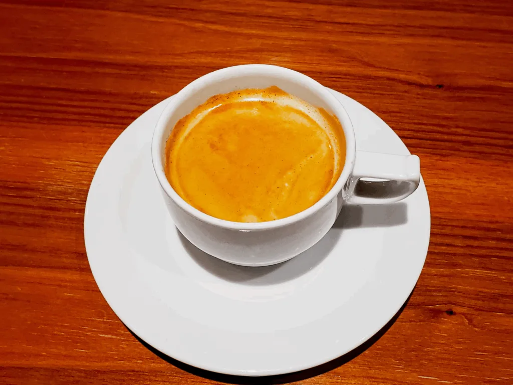 close-up of espresso shot with golden crema"
