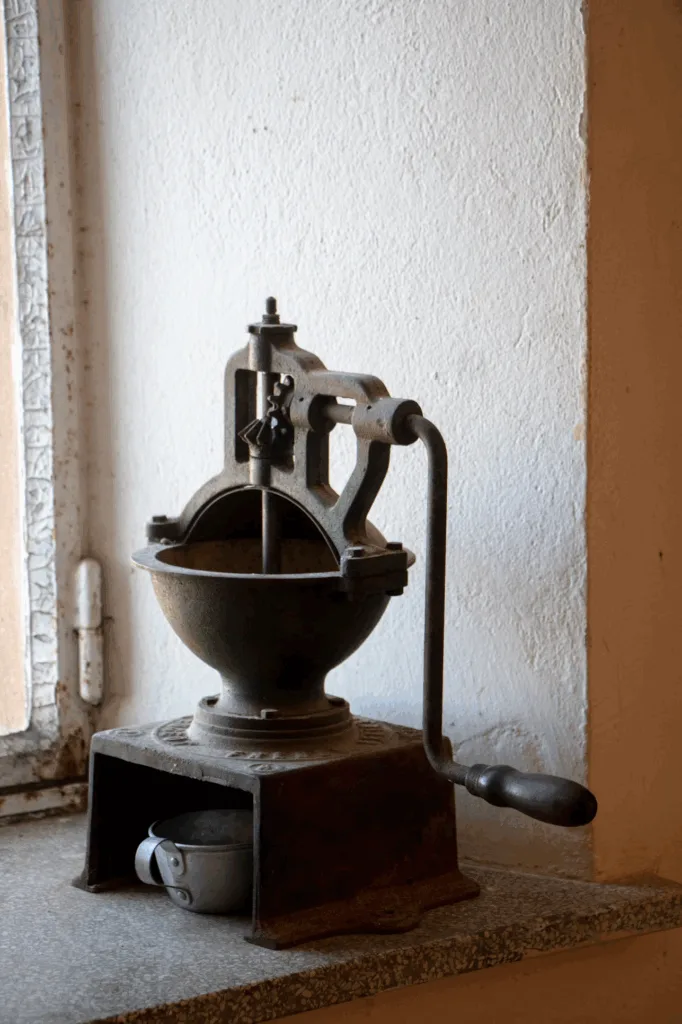 The Evolution of Modern Espresso: How Italian Innovation Revolutionized Coffee Forever 2 historical espresso bean grinder